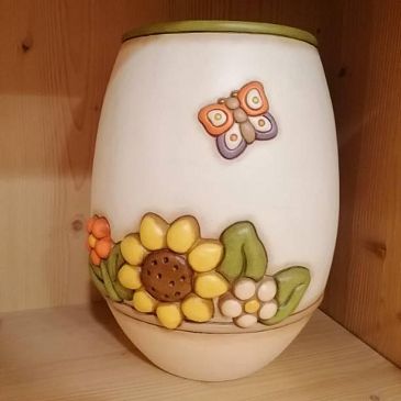 Vaso con girasole e fiori Country